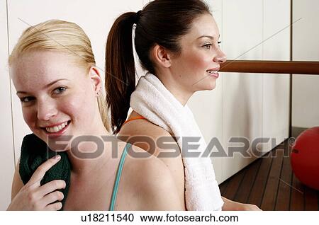 Two young women after a workout View Large Photo Image Stock Image - Two young women after a workout. Fotosearch