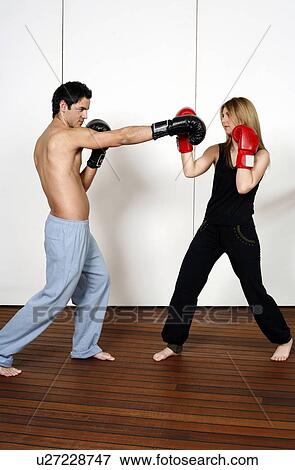 Straight right-hand punch of Active Tae Bo and inside block View Large Photo Image Stock Photo - Straight right-hand punch of Active Tae Bo and inside block. Fotosearch