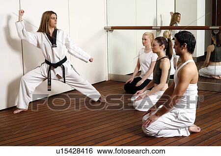 Stock Photograph - Students observing Dantae demonstration. Fotosearch
