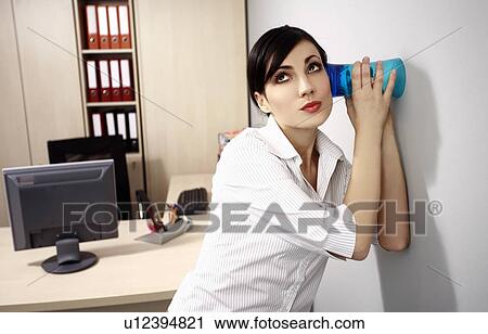 Office worker eavesdropping View Large Photo Image Stock Image - Office worker eavesdropping. Fotosearch