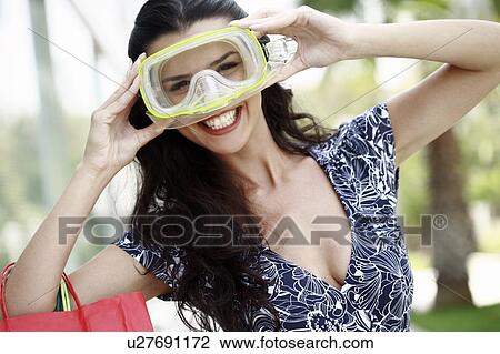 Stock Image - Woman wearing scuba mask. Fotosearch