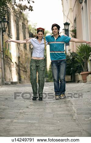 Couple with Greek costume hats dancing View Large Photo Image Stock Image - Couple with Greek costume hats dancing. Fotosearch