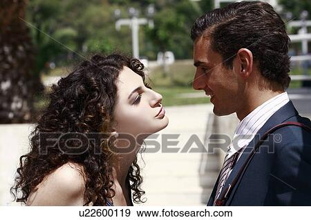 Stock Photo - Business couple in a park. Fotosearch