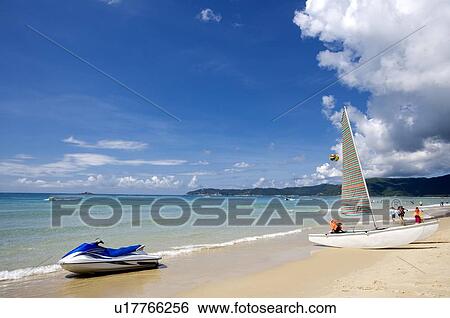 Motorboat and yacht berthing on beach View Large Photo Image Stock Photograph - Motorboat and yacht berthing on beach. Fotosearch
