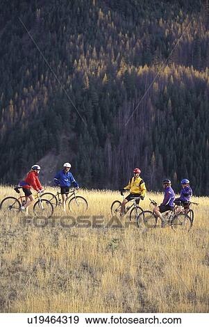 Group of young adults mountain biking at Wigwam Flats near Fernie, BC, Canada View Large Photo Image Stock Photo - Group of young adults mountain biking at Wigwam Flats near Fernie, BC, Canada. Fotosearch