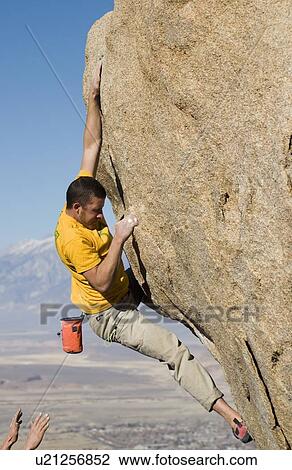 Man (25-30) rock climbing, Bishop, California, USA View Large Photo Image Stock Image - Man (25-30) rock climbing, Bishop, California, USA. Fotosearch