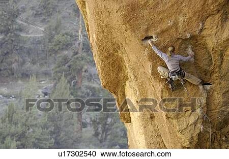 Woman (20-25) rock climbing in Smith Rock State Park, Oregon, USA View Large Photo Image Stock Image - Woman (20-25) rock climbing in Smith Rock State Park, Oregon, USA. Fotosearch
