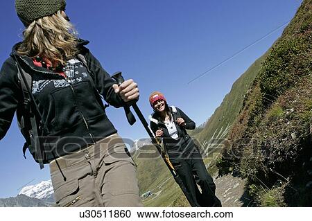 Young girls (19) hiking in front of Mont Blanc, Chamonix, France View Large Photo Image Stock Image - Young girls (19) hiking in front of Mont Blanc, Chamonix, France. Fotosearch