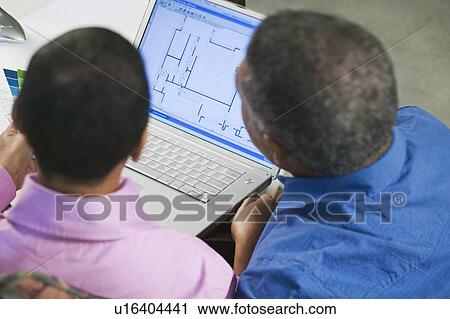 African American couple using a laptop to design a new home or renovation View Large Photo Image Stock Image - African American couple using a laptop to design a new home or renovation. Fotosearch