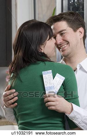 Green gift giving can include giving event tickets instead of material goods, Winnipeg, Canada View Large Photo Image Stock Image - Green gift giving can include giving event tickets instead of material goods, Winnipeg, Canada. Fotosearch