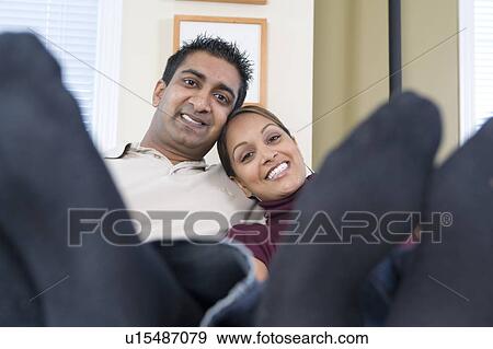 Man and woman with feet up toward camera, Winnipeg, Canada View Large Photo Image Stock Photo - Man and woman with feet up toward camera, Winnipeg, Canada. Fotosearch