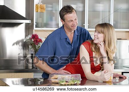 Man with woman eating take out food from containers and spoon made from corn, and which are fully compostable, Winnipeg, Canada View Large Photo Image Stock Photo - Man with woman eating take out food from containers and spoon made from corn, and which are fully compostable, Winnipeg, Canada. Fotosearch
