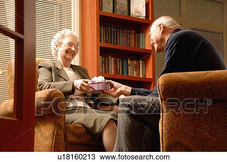 Senior Woman with gift, Regina, Saskatchewan View Large Photo Image Stock Image - Senior Woman with gift, Regina, Saskatchewan. Fotosearch