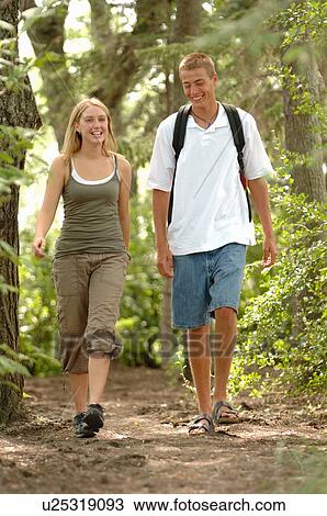 Young couple walking in woods, Regina, Saskatchewan View Large Photo Image Stock Image - Young couple walking in woods, Regina, Saskatchewan. Fotosearch