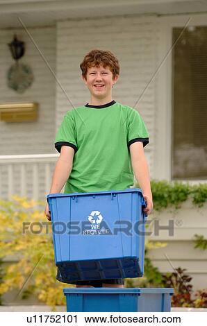 Boy taking recycling to curb, Regina, Saskatchewan View Large Photo Image Stock Image - Boy taking recycling to curb, Regina, Saskatchewan. Fotosearch