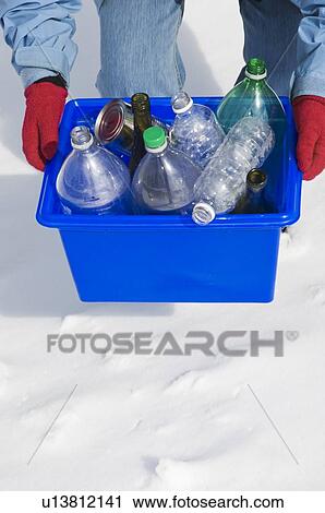 Homemaker taking out "Blue Bin" full of bottles and cans for recycling. View Large Photo Image Stock Image - Homemaker taking out "Blue Bin" full of bottles and cans for recycling.. Fotosearch