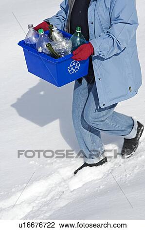 Homemaker taking out "Blue Bin" full of bottles and cans for recycling. View Large Photo Image Stock Image - Homemaker taking out "Blue Bin" full of bottles and cans for recycling.. Fotosearch