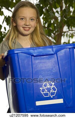 Stock Photography - Young girl with blue box. Fotosearch