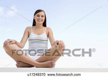 Woman posing outdoors View Large Photo Image Stock Image - Woman posing outdoors. Fotosearch