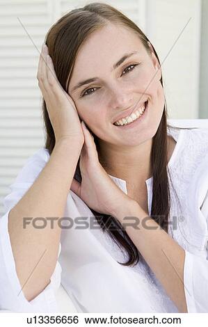 Woman posing outdoors View Large Photo Image Stock Photograph - Woman posing outdoors. Fotosearch