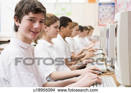 Picture - Students working on computer workstations. Fotosearch