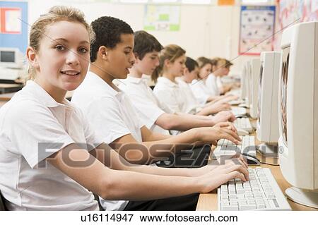 Students working on computer workstations View Large Photo Image Stock Photo - Students working on computer workstations. Fotosearch