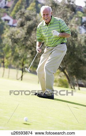 Man Playing A Game Of Golf View Large Photo Image Picture - Man Playing A Game Of Golf. Fotosearch