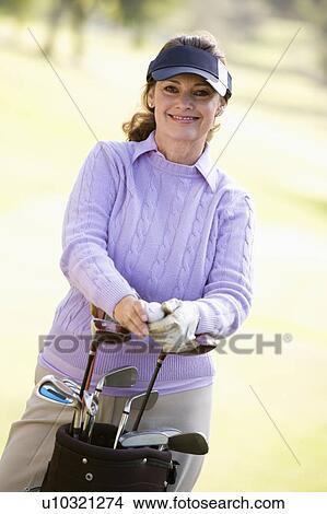 Picture - Portrait Of A Female Golfer. Fotosearch