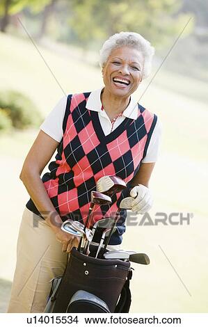 Picture - Portrait Of A Female Golfer. Fotosearch