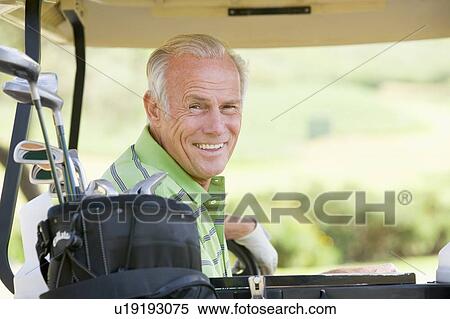 Stock Photography - Portrait Of A Male Golfer. Fotosearch