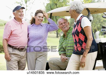 Portrait Of Four Friends Enjoying A Game Golf View Large Photo Image Stock Photography - Portrait Of Four Friends Enjoying A Game Golf. Fotosearch