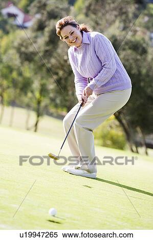 Woman Playing A Game Of Golf View Large Photo Image Stock Photography - Woman Playing A Game Of Golf. Fotosearch
