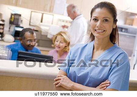 Doctors And Nurses At The Reception Area Of A Hospital View Large Photo Image Stock Image - Doctors And Nurses At The Reception Area Of A Hospital. Fotosearch