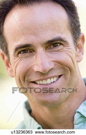 Head shot of man smiling View Large Photo Image Stock Image - Head shot of man smiling. Fotosearch