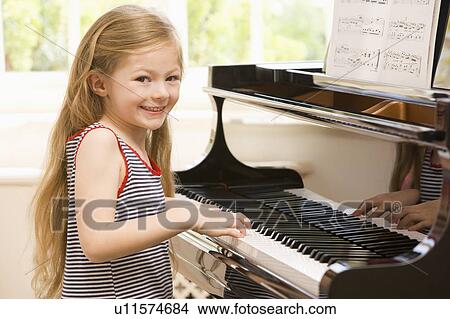 Young Girl Playing Piano View Large Photo Image Picture - Young Girl Playing Piano. Fotosearch