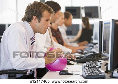 Businessman in office space with a ball View Large Photo Image Stock Photography - Businessman in office space with a ball. Fotosearch