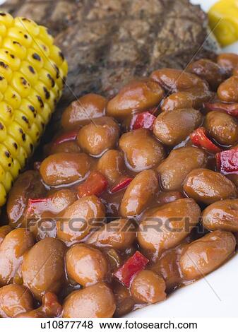 Baked Beans in a Spicy Barbeque Sauce View Large Photo Image Stock Photo - Baked Beans in a Spicy Barbeque Sauce. Fotosearch