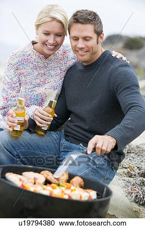 Couple Cooking On A Barbeque View Large Photo Image Stock Image - Couple Cooking On A Barbeque. Fotosearch