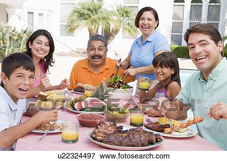 Family Enjoying A Barbeque View Large Photo Image Stock Photo - Family Enjoying A Barbeque. Fotosearch