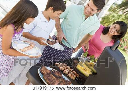 Family Enjoying A Barbeque View Large Photo Image Stock Photography - Family Enjoying A Barbeque. Fotosearch