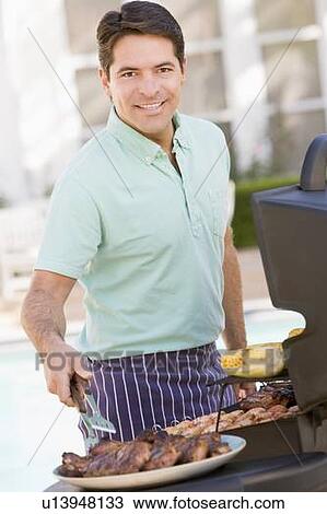 Man Barbequing In A Garden View Large Photo Image Stock Image - Man Barbequing In A Garden. Fotosearch