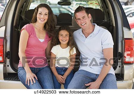 Family sitting in back of van smiling View Large Photo Image Stock Image - Family sitting in back of van smiling. Fotosearch