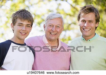 Grandfather with son and grandson smiling. View Large Photo Image Stock Photograph - Grandfather with son and grandson smiling.. Fotosearch