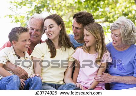 Extended family outdoors smiling View Large Photo Image Stock Photography - Extended family outdoors smiling. Fotosearch