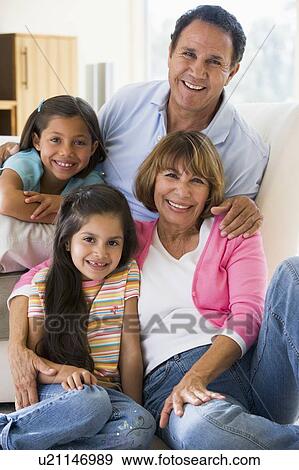 Stock Photo - Grandparents posing with grandchildren.. Fotosearch