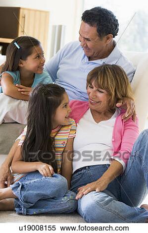Stock Photography - Grandparents talking with grandchildren.. Fotosearch