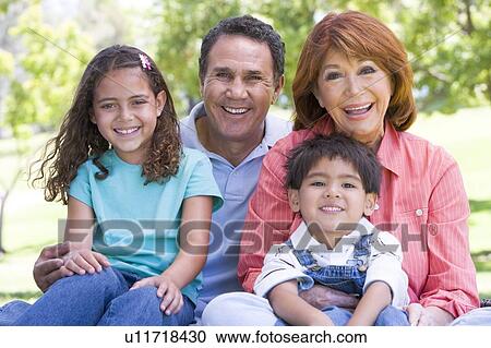 Grandparents posing with grandchildren. View Large Photo Image Stock Image - Grandparents posing with grandchildren.. Fotosearch