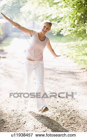 Stock Photo - Females, Forest, Park, Path, Walking, Woman, Women. Fotosearch