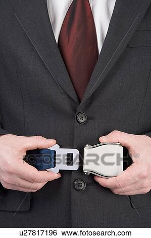 Businessman Fastening Safety Belt View Large Photo Image Stock Photograph - Businessman Fastening Safety Belt. Fotosearch