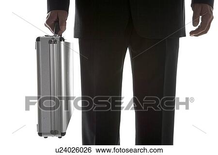 Businessman Holding Sturdy Silver Suitcase View Large Photo Image Stock Photograph - Businessman Holding Sturdy Silver Suitcase. Fotosearch